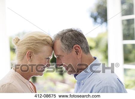 Senior couple leaning head to head View Large Photo Image Stock Photography - Senior couple leaning head to head. Fotosearch