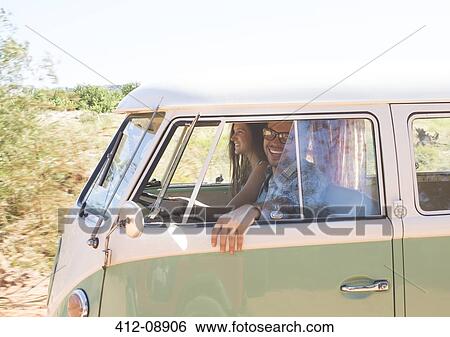 Couple in camper van View Large Photo Image Stock Photograph - Couple in camper van. Fotosearch