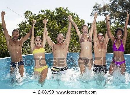 Friends playing in swimming pool View Large Photo Image Stock Photo - Friends playing in swimming pool. Fotosearch