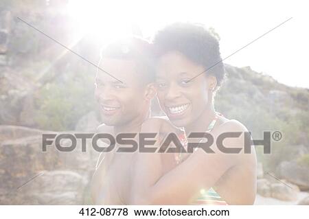 Portrait of smiling couple outdoors View Large Photo Image Stock Photo - Portrait of smiling couple outdoors. Fotosearch