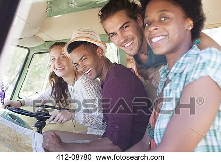 Portrait of smiling friends in camper van View Large Photo Image Stock Image - Portrait of smiling friends in camper van. Fotosearch