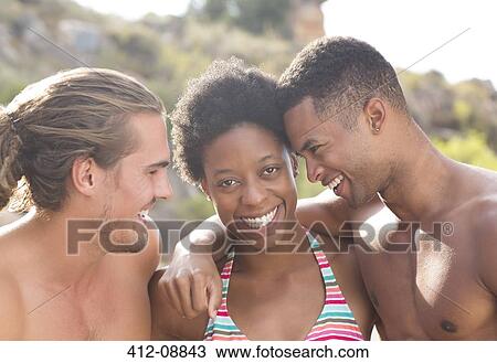 Stock Image - Portrait of smiling friends. Fotosearch