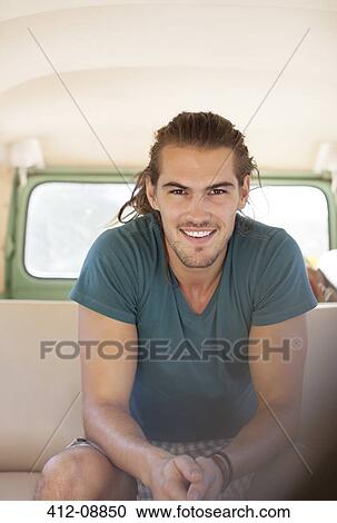 Portrait of smiling man in van View Large Photo Image Stock Image - Portrait of smiling man in van. Fotosearch