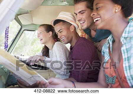 Smiling friends in van View Large Photo Image Stock Image - Smiling friends in van. Fotosearch
