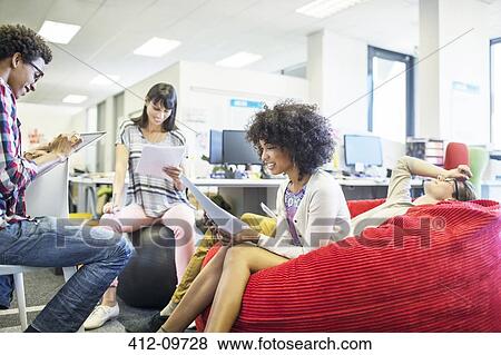 Business people talking in meeting View Large Photo Image Stock Photo - Business people talking in meeting. Fotosearch
