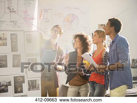 Business people talking in office View Large Photo Image Stock Image - Business people talking in office. Fotosearch