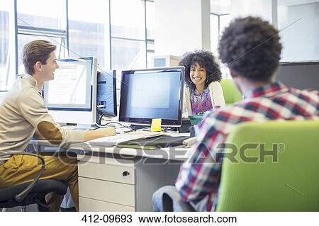 Business people talking in office View Large Photo Image Stock Image - Business people talking in office. Fotosearch