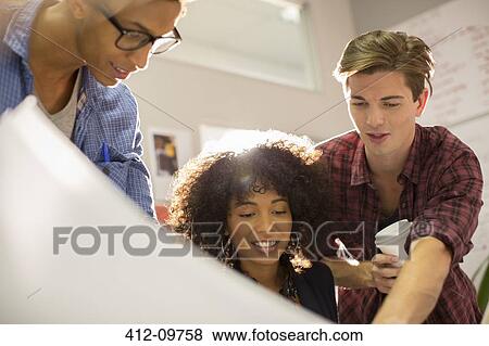 Business people talking in office View Large Photo Image Stock Photo - Business people talking in office. Fotosearch
