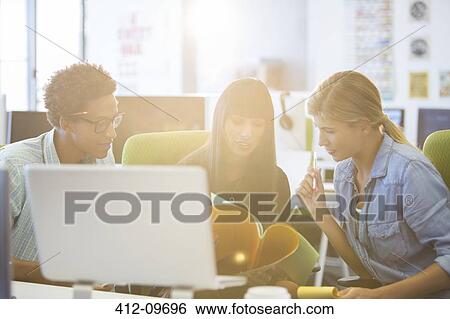 Business people talking in office View Large Photo Image Stock Photograph - Business people talking in office. Fotosearch