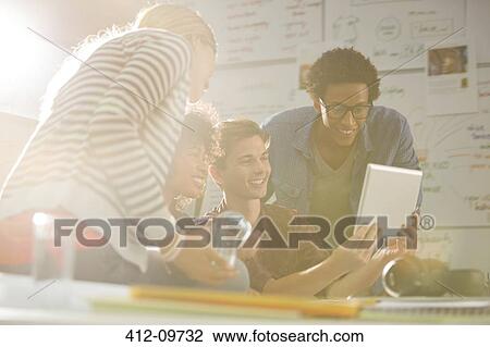Business people using digital tablet in meeting View Large Photo Image Stock Image - Business people using digital tablet in meeting. Fotosearch