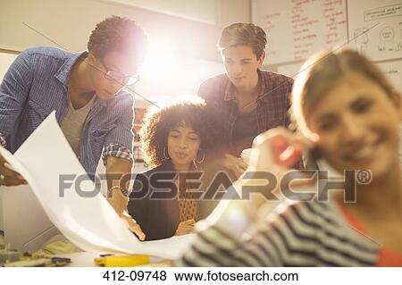 Business people working in office View Large Photo Image Stock Photo - Business people working in office. Fotosearch