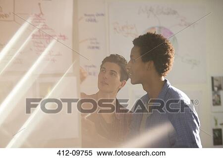 Businessmen talking in meeting View Large Photo Image Stock Photography - Businessmen talking in meeting. Fotosearch