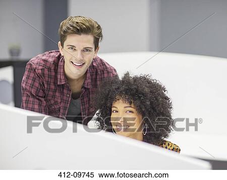 Portrait of smiling business people in office View Large Photo Image Stock Photography - Portrait of smiling business people in office. Fotosearch