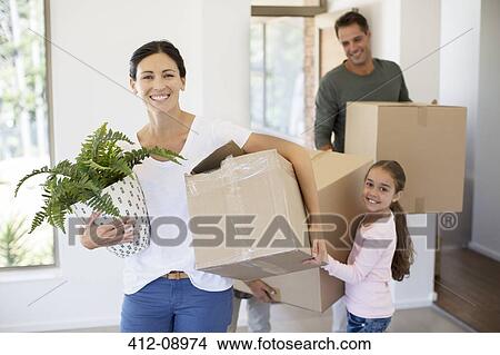 Family moving into new house View Large Photo Image Picture - Family moving into new house. Fotosearch