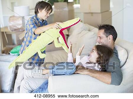 Father and children playing in new house View Large Photo Image Stock Photography - Father and children playing in new house. Fotosearch