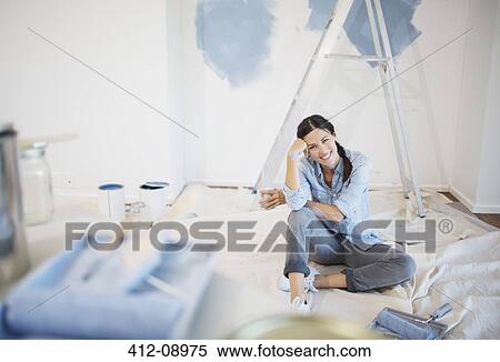 Portrait of woman surrounded by paint supplies View Large Photo Image Stock Photography - Portrait of woman surrounded by paint supplies. Fotosearch