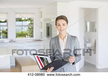 Realtor showing empty house View Large Photo Image Stock Image - Realtor showing empty house. Fotosearch