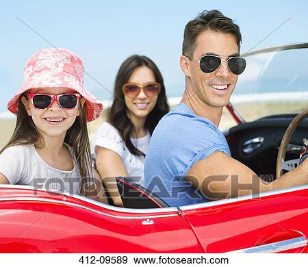 Family driving in convertible on beach View Large Photo Image Stock Photo - Family driving in convertible on beach. Fotosearch