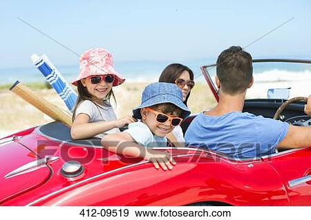 Family riding in convertible at beach View Large Photo Image Stock Photo - Family riding in convertible at beach. Fotosearch