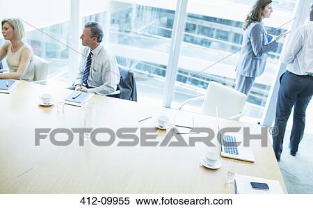 Business people in conference room View Large Photo Image Stock Photography - Business people in conference room. Fotosearch