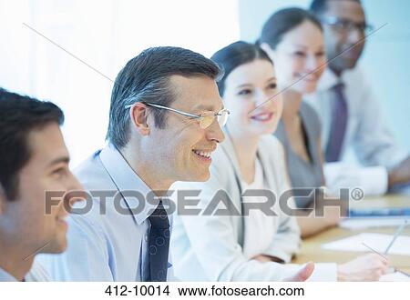 Business people talking in meeting View Large Photo Image Picture - Business people talking in meeting. Fotosearch