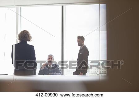 Business people talking in meeting View Large Photo Image Stock Image - Business people talking in meeting. Fotosearch