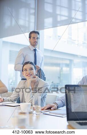 Business people talking in meeting View Large Photo Image Stock Image - Business people talking in meeting. Fotosearch