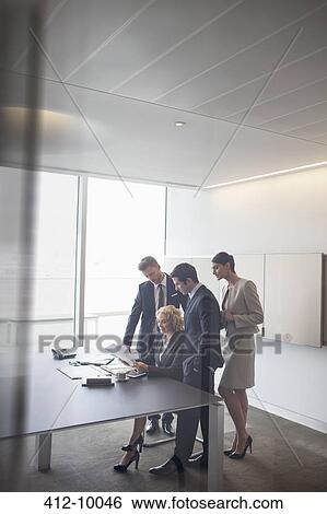 Business people talking in meeting View Large Photo Image Stock Photograph - Business people talking in meeting. Fotosearch