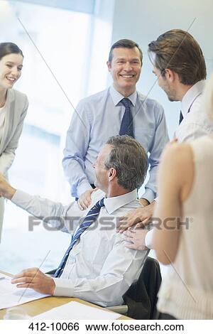 Business people talking in meeting View Large Photo Image Stock Photograph - Business people talking in meeting. Fotosearch