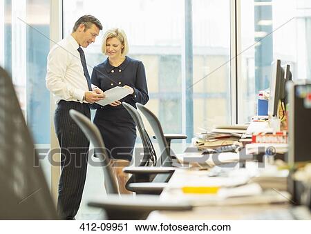 Business people talking in office View Large Photo Image Stock Image - Business people talking in office. Fotosearch