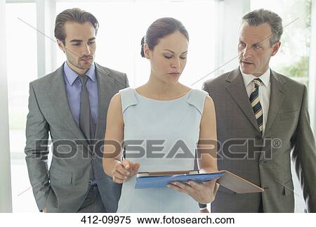 Stock Photography - Business people talking in office. Fotosearch