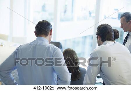 Business people working in conference room View Large Photo Image Stock Photography - Business people working in conference room. Fotosearch