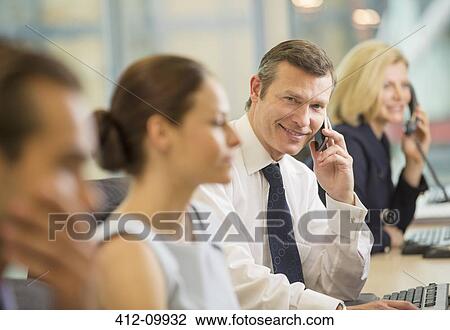 Business people working in office View Large Photo Image Stock Image - Business people working in office. Fotosearch