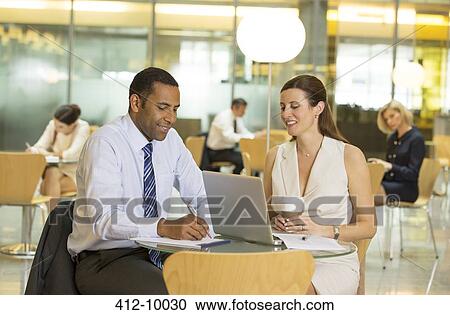 Business people working in office View Large Photo Image Stock Image - Business people working in office. Fotosearch