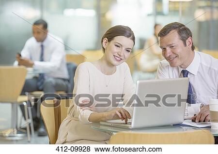 Business people working in office View Large Photo Image Stock Photo - Business people working in office. Fotosearch