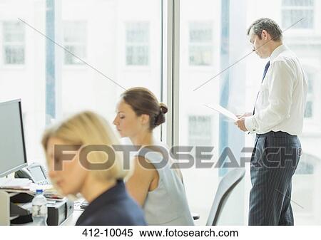 Business people working in office View Large Photo Image Stock Photography - Business people working in office. Fotosearch