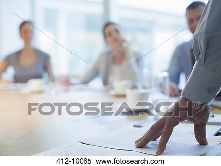 Businessman talking in meeting View Large Photo Image Stock Photography - Businessman talking in meeting. Fotosearch