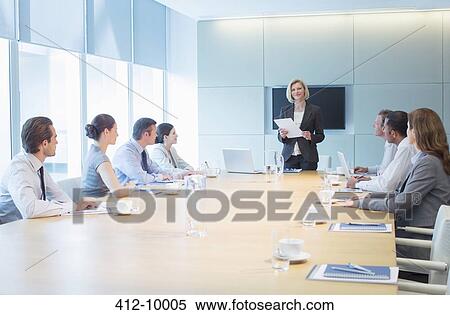 Businesswoman talking in meeting View Large Photo Image Stock Photography - Businesswoman talking in meeting. Fotosearch
