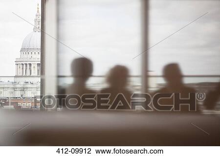 Silhouette of business people in meeting View Large Photo Image Stock Image - Silhouette of business people in meeting. Fotosearch
