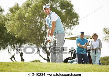 Senior friends playing golf View Large Photo Image Picture - Senior friends playing golf. Fotosearch