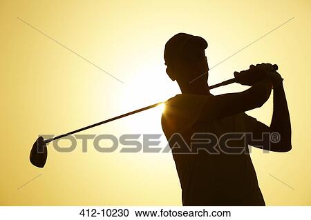 Silhouette of man playing golf outdoors View Large Photo Image Stock Image - Silhouette of man playing golf outdoors. Fotosearch