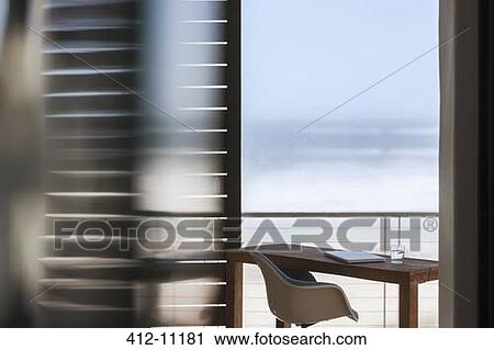 Desk on patio overlooking ocean View Large Photo Image Stock Image - Desk on patio overlooking ocean. Fotosearch