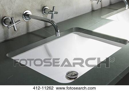 Faucet and sink in modern bathroom View Large Photo Image Stock Image - Faucet and sink in modern bathroom. Fotosearch