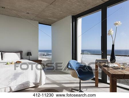 Modern bedroom overlooking ocean View Large Photo Image Stock Image - Modern bedroom overlooking ocean. Fotosearch