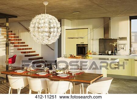 Set table in modern dining room View Large Photo Image Stock Image - Set table in modern dining room. Fotosearch