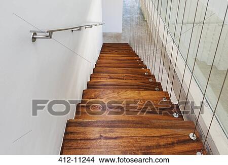 Picture - Wooden staircase of modern house. Fotosearch