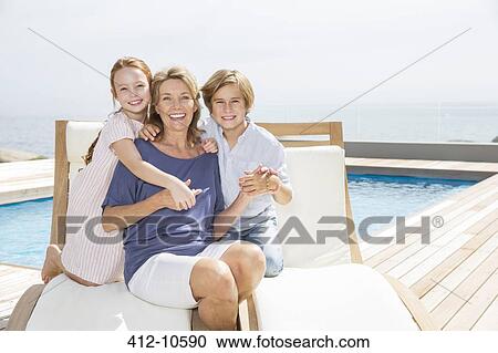 Grandmother and grandchildren at poolside View Large Photo Image Stock Image - Grandmother and grandchildren at poolside. Fotosearch