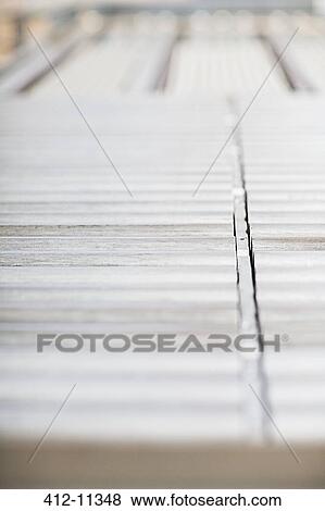 Stock Photo - Close up of conveyor belt in factory. Fotosearch