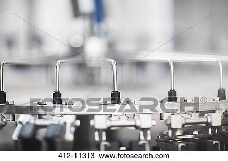 Stock Image - Close up of machinery in factory. Fotosearch