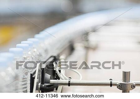 Stock Photograph - Close up of machinery in factory. Fotosearch